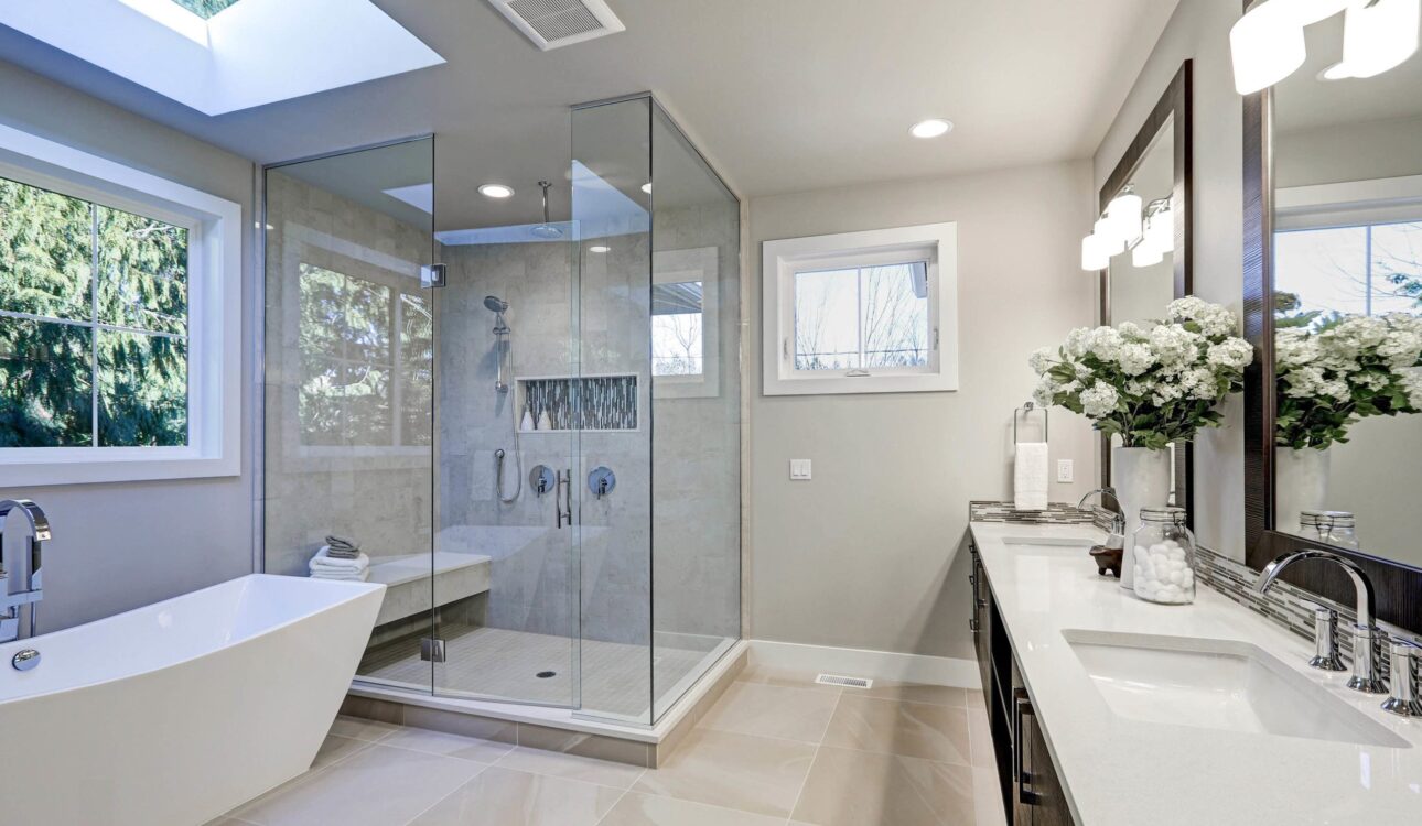 Spacious bathroom in gray tones with heated floors